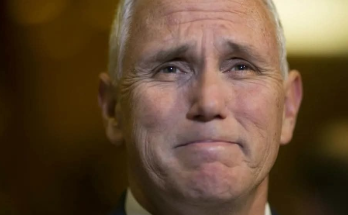 Mike Pence delivering a sad announcement at a podium with an emotional expression