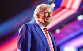 Trump mug shot framed in White House hallway