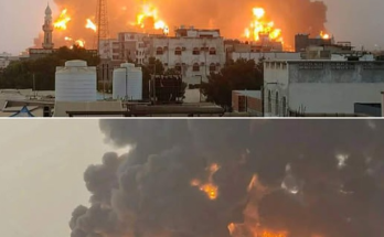Burning oil tanks at Hodeida port after strike