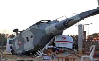 Crashed helicopter crushing vehicles in residential zone