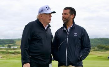 Donald Trump with grandchildren during Trump Scotland visit before boarding Air Force One