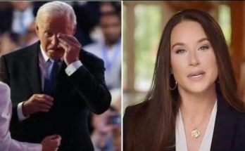 Biden facepalms next to Tulsi Gabbard
