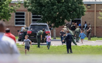 Children running from school shooting