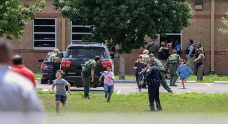 Children running from school shooting