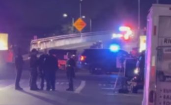 Night police emergency scene under bridge