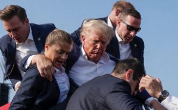 Trump shielded by Secret Service agents