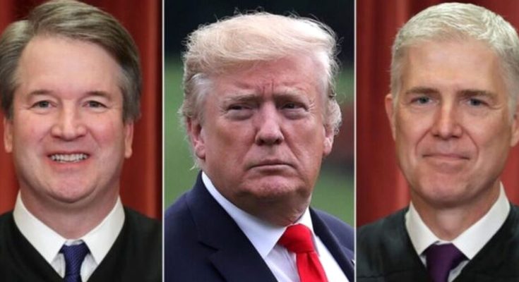 three men in judicial robes and suits against red drapes, including Donald Trump